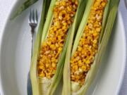 Pan-roasted corn, off the cob, served in corn husks (Hillary Levin/St.