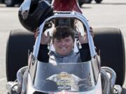 Cooper Chun, 16, of Vancouver pauses for a photo in his 1999 Mullis Rear Engine Dragster at Portland International Raceway on Wednesday evening, August 12, 2020.