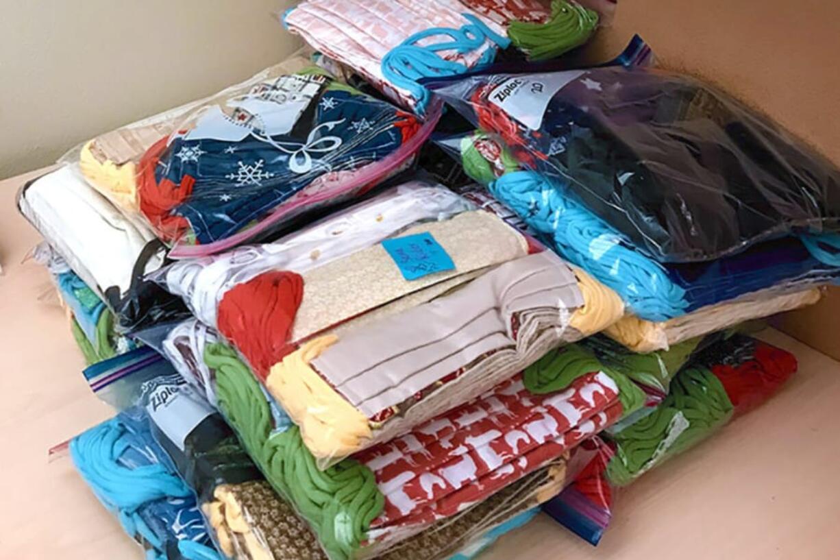 MEADOW HOMES:  Members of the SEWcial Distance Club recently sewed and donated 1,500 cloth masks to ESD 112 for its employees and others to use.