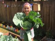 Melanie Gilbert, 12, has been keeping busy during the pandemic by maintaining a Victory Garden.