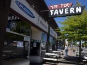 The Tip Top Tavern voluntarily closed Saturday, citing concerns about the difficulty of enforcing the requirement that customers wear masks when not at their tables.