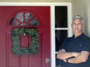 Bob Garick stands by the entrance to his home Wednesday, Aug. 5, 2020, in Oviedo, Fla. Garick was looking forward to being a field supervisor during the door-knocking phase of the 2020 census, but as the number of new coronavirus cases in Florida shot up last month, he changed his mind and decided not to take the job.