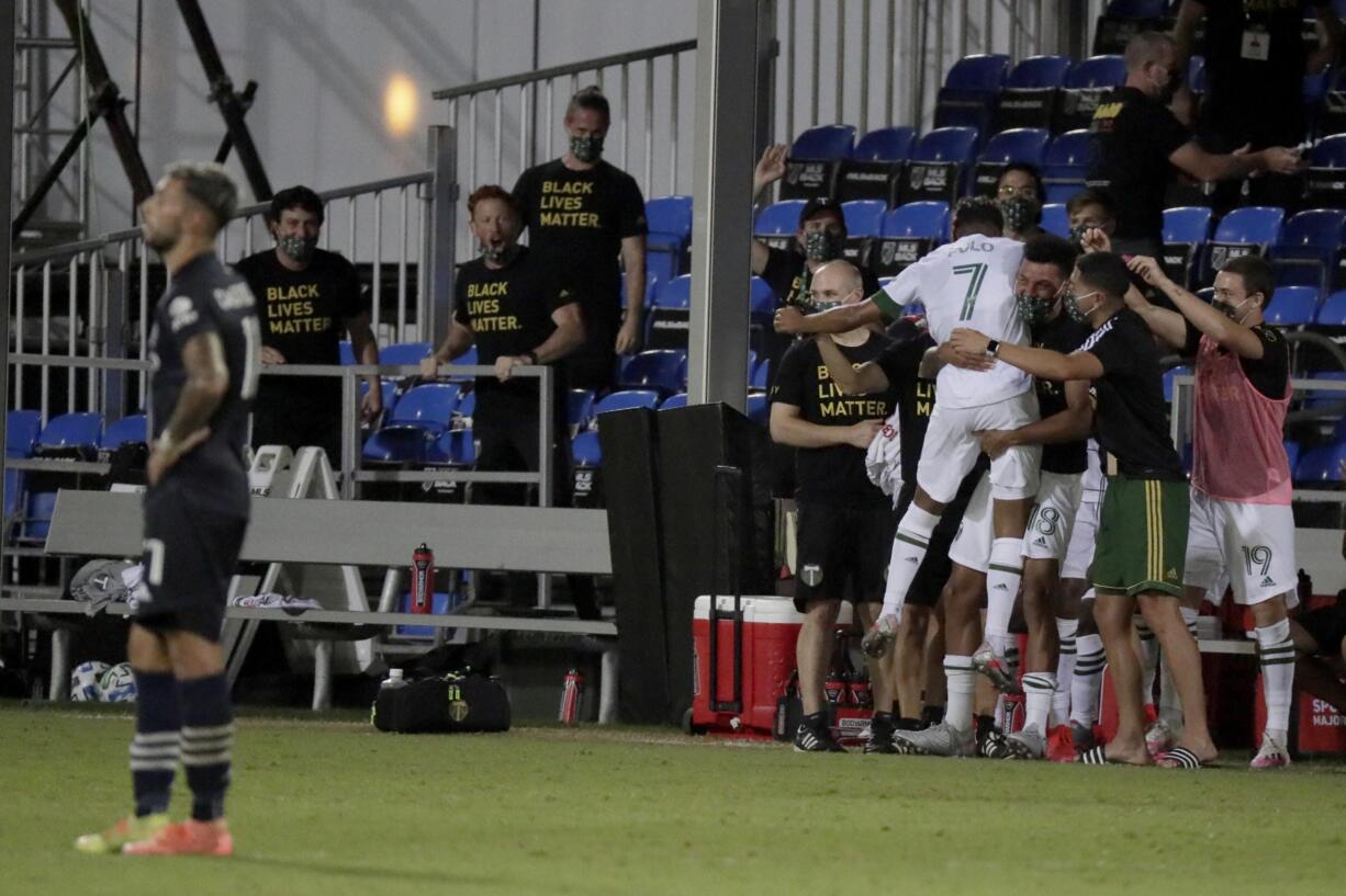 Portland Timbers forward Andy Polo (7) celebrates his goal against the New York City during the second half of an MLS soccer match, Sunday, Aug. 2, 2020, in Kissimmee, Fla.