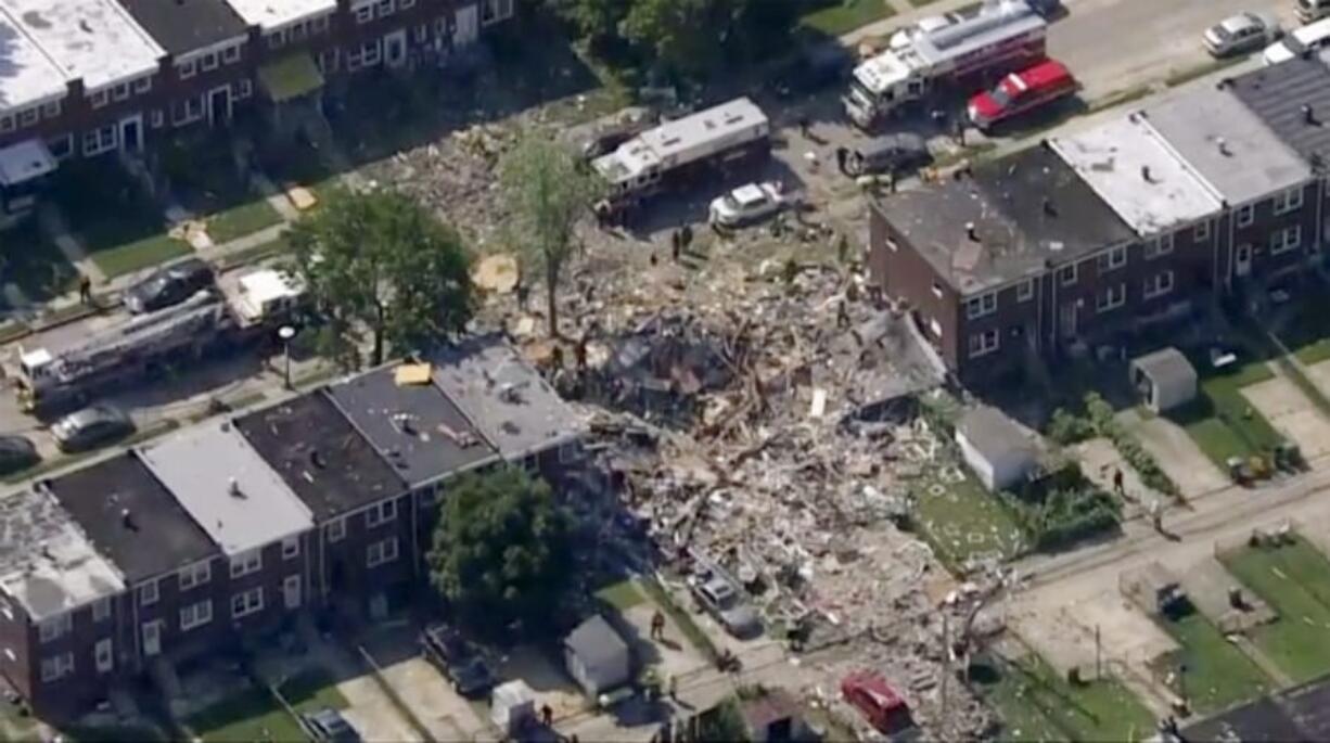This photo provided by WJLA-TV shows the scene of an explosion in Baltimore on Monday, Aug. 10, 2020. Baltimore firefighters say an explosion has leveled several homes in the city.