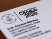 An envelope containing a 2020 census letter mailed to a U.S. resident in Detroit.