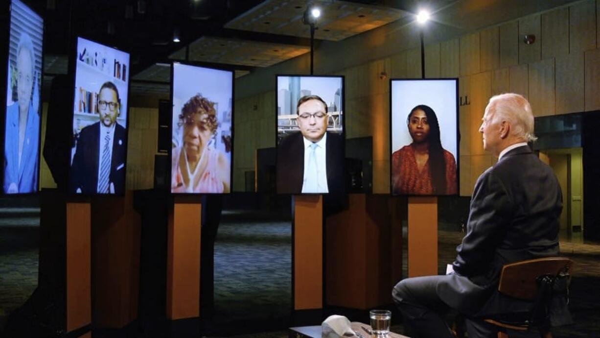 In this image from video, Democratic presidential candidate former Vice President Joe Biden leads a conversation on racial justice with Art Acevedo, Jamira Burley, Gwen Carr, Derrick Johnson and Lori Lightfoot during the first night of the Democratic National Convention on Monday, Aug. 17, 2020.