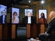 In this image from video, Democratic presidential candidate former Vice President Joe Biden leads a conversation on racial justice with Art Acevedo, Jamira Burley, Gwen Carr, Derrick Johnson and Lori Lightfoot during the first night of the Democratic National Convention on Monday, Aug. 17, 2020.