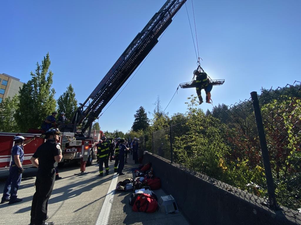 The Clackamas County Sheriff's Office works to recover the body of a missing Vancouver man from a ravine near Southeast 97th and Sunnybrook Boulevard in Clackamas.