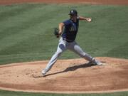 Seattle Mariners starting pitcher Marco Gonzales delivers during the first inning of a baseball game against the Los Angeles Angels in Anaheim, Calif., Monday, Aug. 31, 2020.