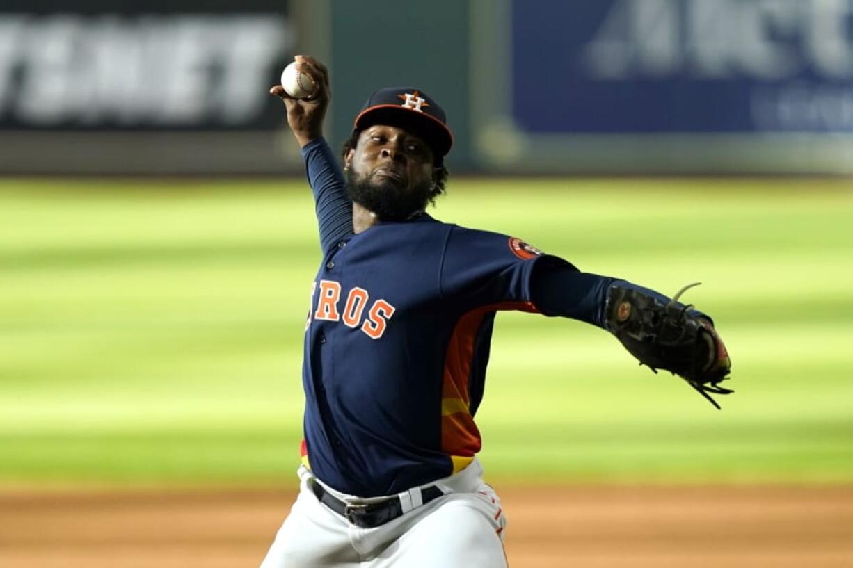 Houston Astros starting pitcher Cristian Javier throws against the Seattle Mariners during the first inning of a baseball game Saturday, Aug. 15, 2020, in Houston. (AP Photo/David J.