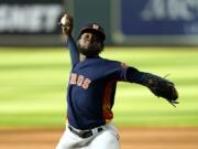 Houston Astros starting pitcher Cristian Javier throws against the Seattle Mariners during the first inning of a baseball game Saturday, Aug. 15, 2020, in Houston. (AP Photo/David J.