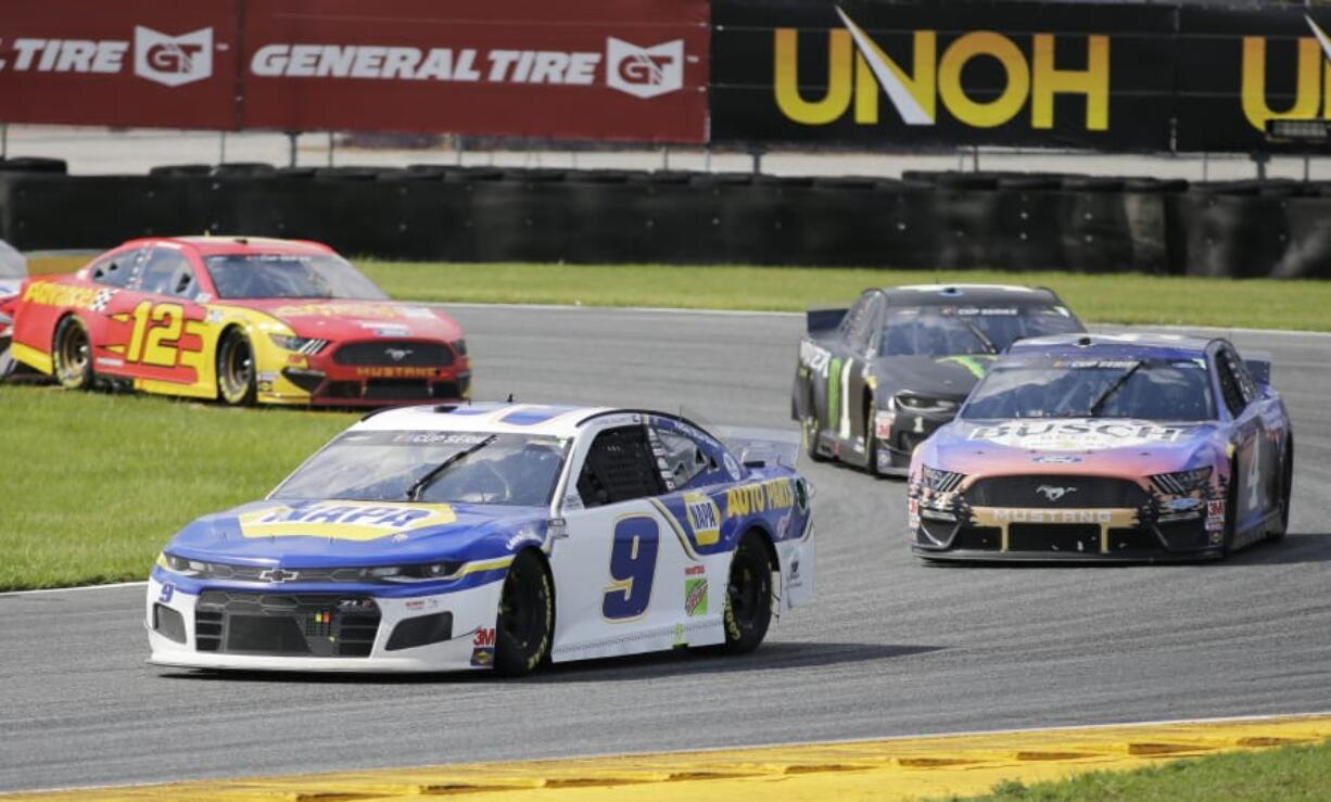 Chase Elliott (9) leads Kevin Harvick (4), Kurt Busch (1) and Ryan Blaney through Turn 3 during a NASCAR Cup Series auto race at Daytona International Speedway, Sunday, Aug. 16, 2020, in Daytona Beach, Fla.