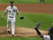 Chicago White Sox starting pitcher Lucas Giolito (27) reacts with catcher James McCann after closing out a no-hitter in a baseball game against the Pittsburgh Pirates, Tuesday, Aug. 25, 2020, in Chicago. The White Sox won 4-0.