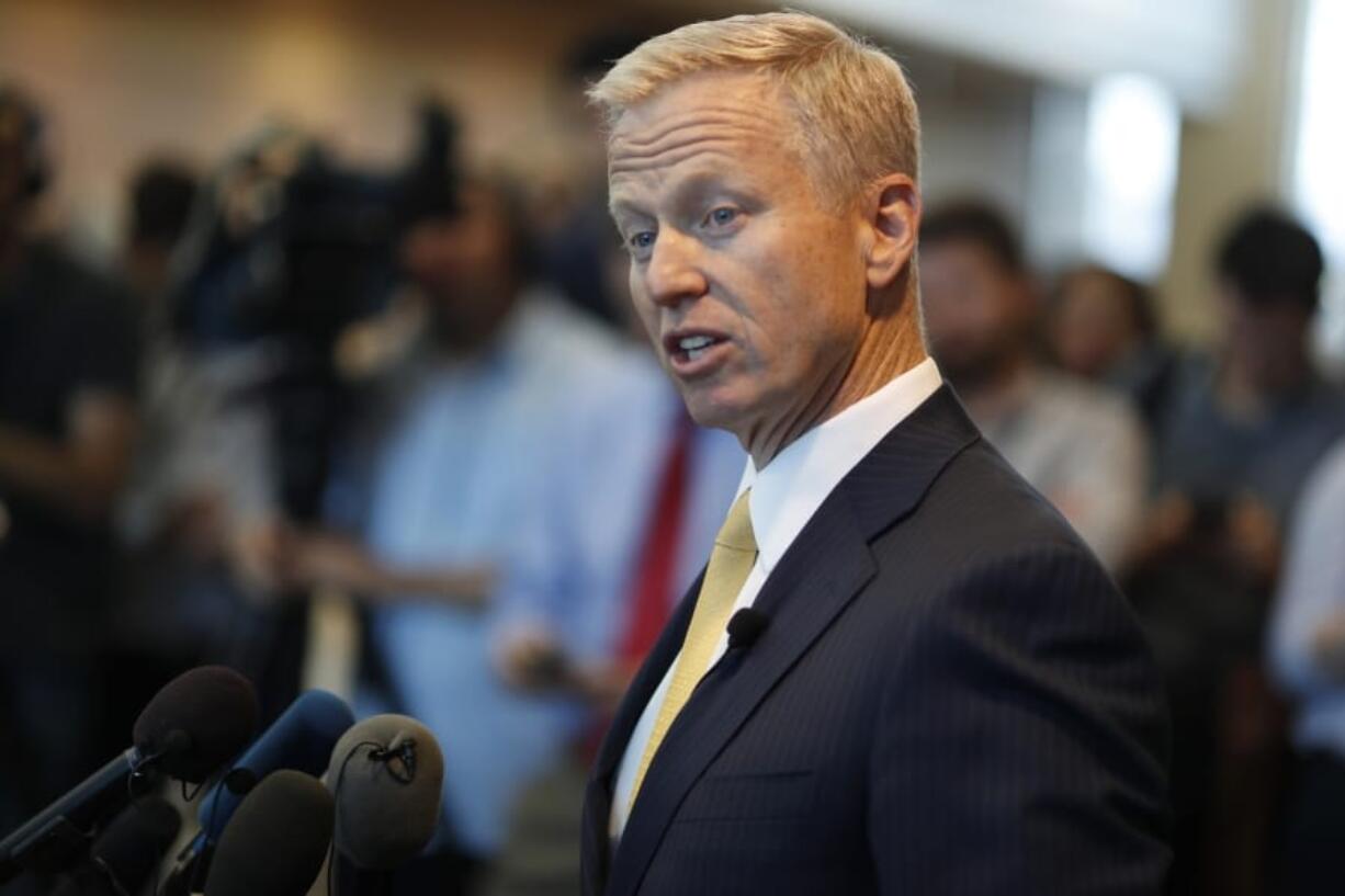 FILE - In this May 15, 2019, file photo, District Attorney George Brauchler speaks during a news conference in Castle Rock, Colo. An investigation will determine if police officers in suburban Denver will face charges after handcuffing two Black girls and placing them on the ground while mistakenly suspecting they were riding in a stolen car, a prosecutor said Friday, Aug. 7, 2020. Aurora Police Chief Vanessa Wilson and the department are cooperating with the investigation, Brauchler said.