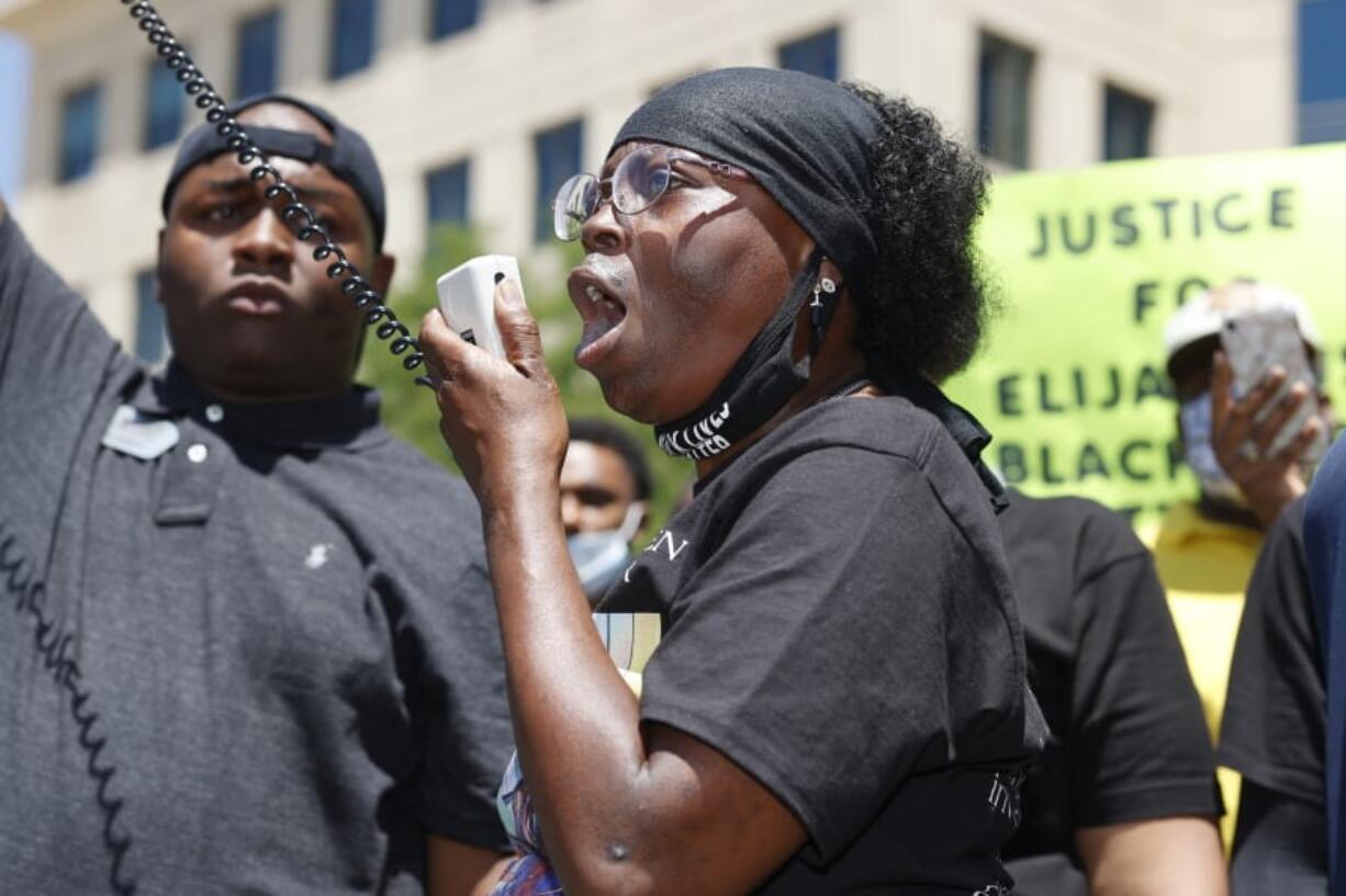 FILE - In this June 27, 2020, file photo, Sheneen McClain speaks during a rally and march over the death of her son, Elijah McClain, outside the police department in Aurora, Colo. The parents of Elijah McClain, a 23-year-old Black man who died after officers in suburban Denver stopped him on the street last year and put him in a chokehold, sued police and medical officials Tuesday, Aug. 11.