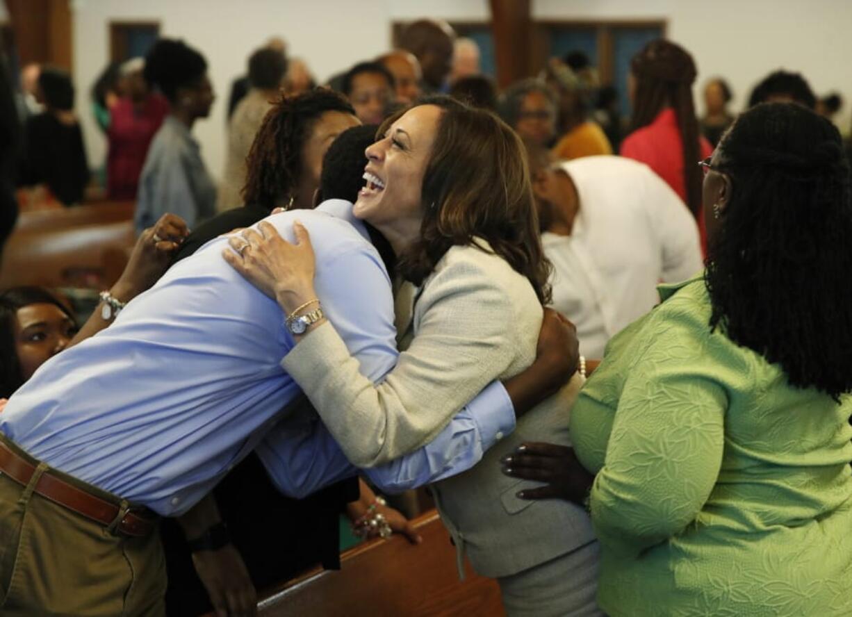 Sen. Kamala Harris, D-Calif., meets people before a Corinthian Baptist Church service, Sunday, Aug. 11, 2019, in Des Moines, Iowa. Harris, tapped on Tuesday, Aug. 11, 2020 as Joe Biden&#039;s running mate, attended services at both a Black Baptist church and a Hindu temple growing up.