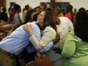 Sen. Kamala Harris, D-Calif., meets people before a Corinthian Baptist Church service, Sunday, Aug. 11, 2019, in Des Moines, Iowa. Harris, tapped on Tuesday, Aug. 11, 2020 as Joe Biden&#039;s running mate, attended services at both a Black Baptist church and a Hindu temple growing up.