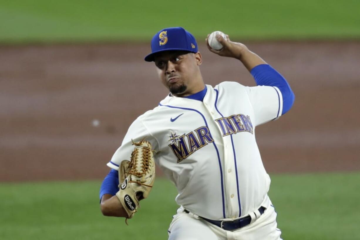 CORRECTS TO STARTING PITCHER - Seattle Mariners starting pitcher Justus Sheffield throws against the Colorado Rockies in the second inning of a baseball game Sunday, Aug. 9, 2020, in Seattle.