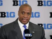 FILE - In this June 4, 2019, file photo,  Minnesota Vikings chief operating officer Kevin Warren talks to reporters after being named Big Ten Conference Commissioner during a news conference in Rosemont, Ill. After the Power Five conference commissioners met Sunday, Aug.