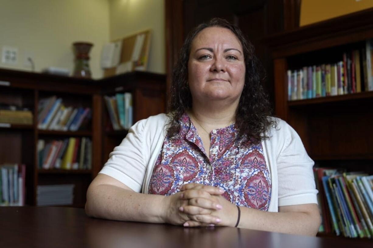 Dr. Michelle LaRue sits for a portrait in Hyattsville, Md., on Wednesday, Aug. 12, 2019. LaRue is a manager at CASA de Maryland, an immigration advocacy group that has partnered with health officials in Prince George&#039;s County just outside of Washington. D.C., to make the calls to Spanish speakers. She said earning trust begins with hiring contact tracers who not only speak Spanish but also intimately understand immigrant communities.