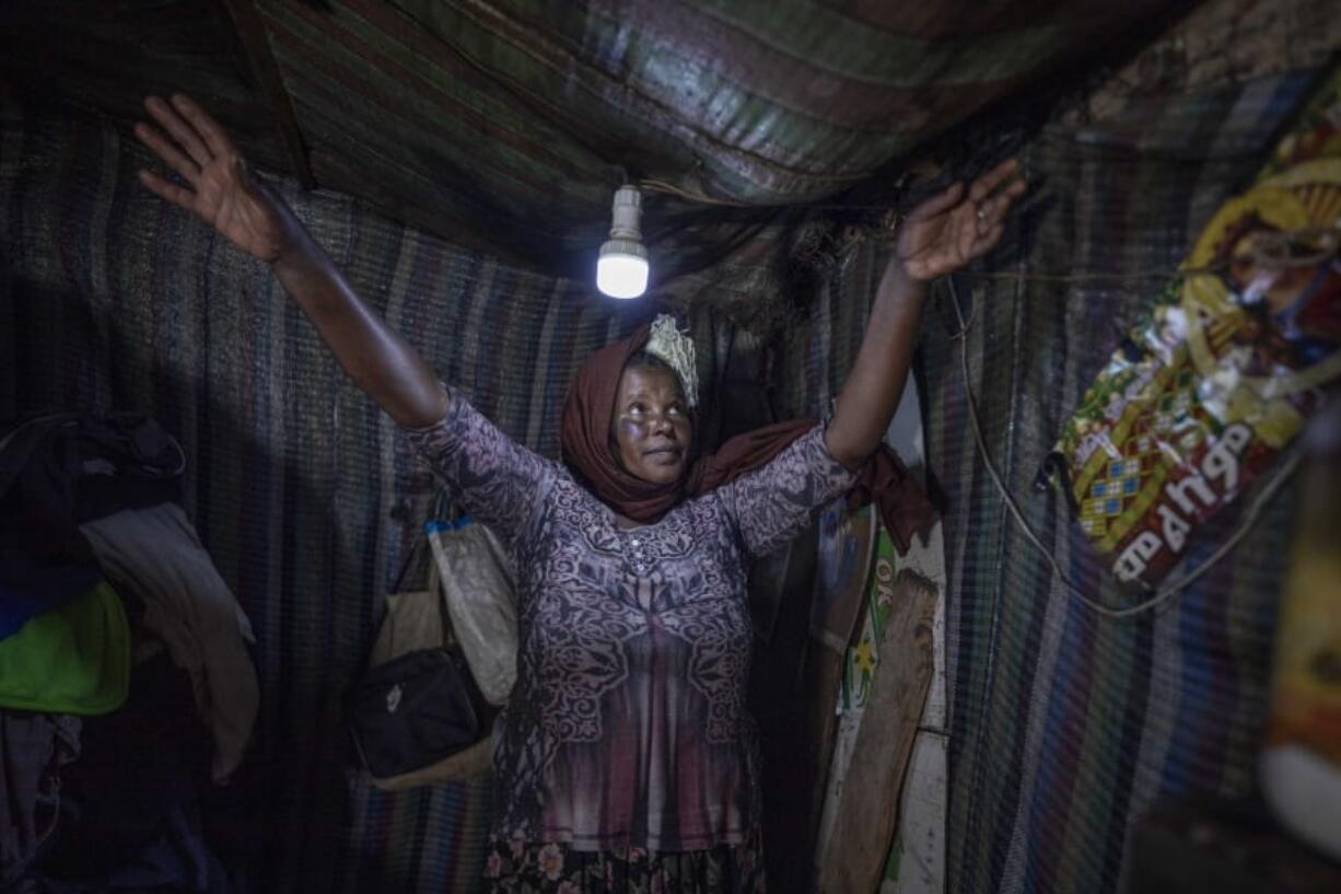 Mother of two Amsale Hailemariam, a domestic worker who lost work because of the coronavirus, stands in her small tent in the capital Addis Ababa, Ethiopia on Friday, June 26, 2020. Decades of progress in one of modern history&#039;s greatest achievements, the fight against extreme poverty, are now in danger of slipping away due to the coronavirus and the world could see the first global increase in extreme poverty in 22 years, further sharpening inequality.