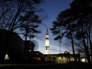 FILE - An employee leaves the state operated U.S. Space &amp; Rocket Center, which serves as the visitor center for the nearby federally funded NASA Marshall Space Flight Center, in Huntsville, Ala. in this Tuesday, Jan. 8, 2019 file photo.