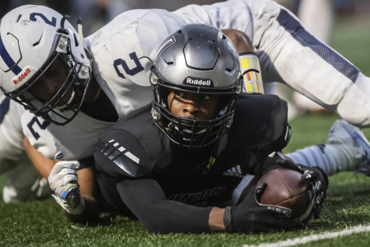 Union&#039;s Tobias Merriweather, with ball, is among the top college recruits in Southwest Washington. He and other high school athletes are calling for Governor Jay Inslee and the WIAA to allow fall sports to be played this fall.