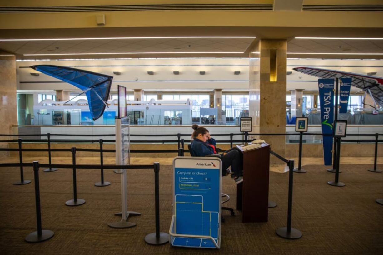 TSA checkpoint at John Wayne Airport, near empty, on March 24, in Santa Ana, Calif. (Jay L.