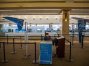 TSA checkpoint at John Wayne Airport, near empty, on March 24, in Santa Ana, Calif. (Jay L.