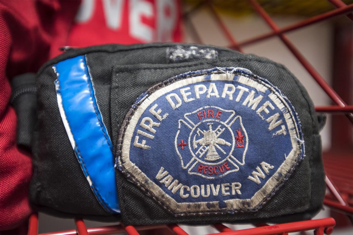 A Vancouver Fire Department patch is seen here in the gear room of Fire Station 2 (The Columbian files)