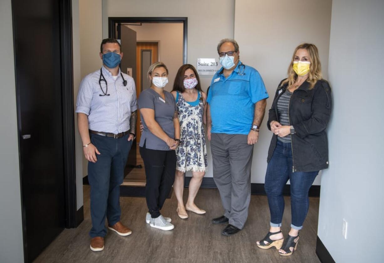 The staff at Delta Direct Care clinic are pictured in Vancouver. The clinic has a small staff, but also has a smaller patient group, which allows them to schedule appointments quickly and easily.