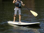 TIGARD, Ore.: Mariele Balasbas from Boys &amp; Girls Clubs of Southwest Washington and Teen Turf Club partnered with Chill, an organization that reaches youth through board sports, and Cascadia SUP &amp; SURF to engage four club members in paddleboarding at Cook Park in Tigard, Ore.