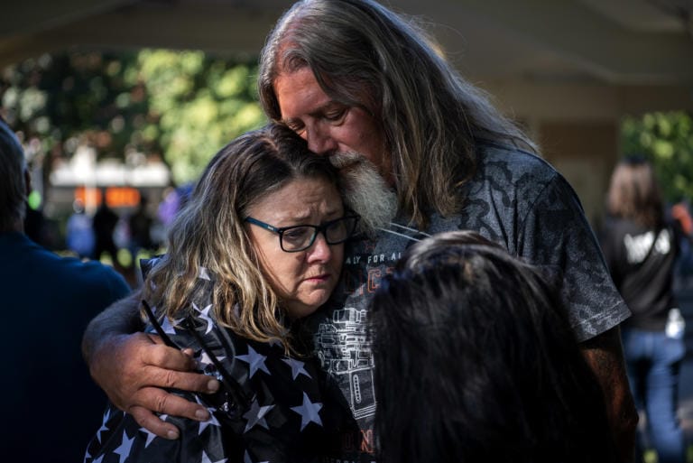 LaDon Deatherage of Vancouver embraces David Machado after the memorial to remember Aaron "Jay" Danielson who was fatally shot after a pro-Trump rally in Portland last month, at Esther Short Park in Vancouver on September 5, 2020. Deatherage and Machado were both friends with Jay and fellow Patriot Prayer members. "My heart is heavy," said Detherage.