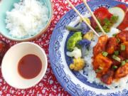 This tangy chicken is first fried with a light flour coating before being stirred into a mildly spicy tomato sauce.