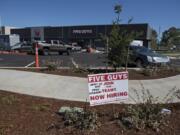 The new Five Guys Burgers and Fries restaurant at Vancouver Mall appears to be on the verge of opening, with most of the construction equipment removed and &quot;now hiring&quot; signs placed out front.