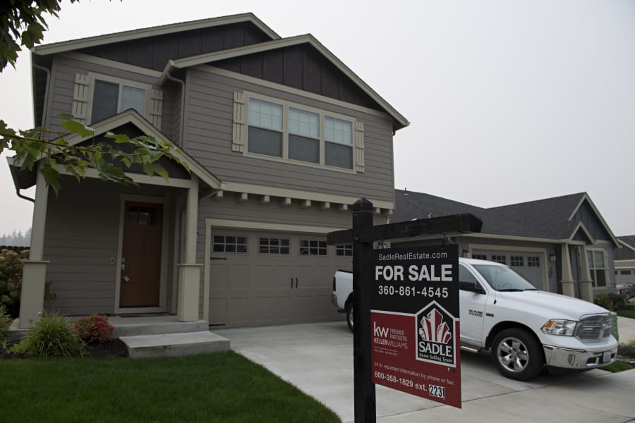 A for sale sign is posted outside a home on Northeast 133rd Way.