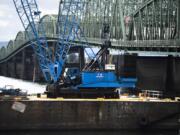 Crews on Saturday began a nine-day trunnion repair project on the Interstate 5 Bridge.