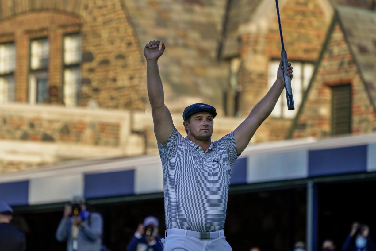 Bryson DeChambeau, of the United States, reacts after sinking a putt for par on the 18th hole to win the US Open Golf Championship, Sunday, Sept. 20, 2020, in Mamaroneck, N.Y.