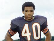 Chicago Bears football player Gale Sayers in 1970. Hall of Famer Gale Sayers, who made his mark as one of the NFL’s best all-purpose running backs and was later celebrated for his enduring friendship with a Chicago Bears teammate with cancer, has died. He was 77. Nicknamed “The Kansas Comet” and considered among the best open-field runners the game has ever seen, Sayers died Wednesday, Sept. 23, 2020, according to the Pro Football Hall of Fame.