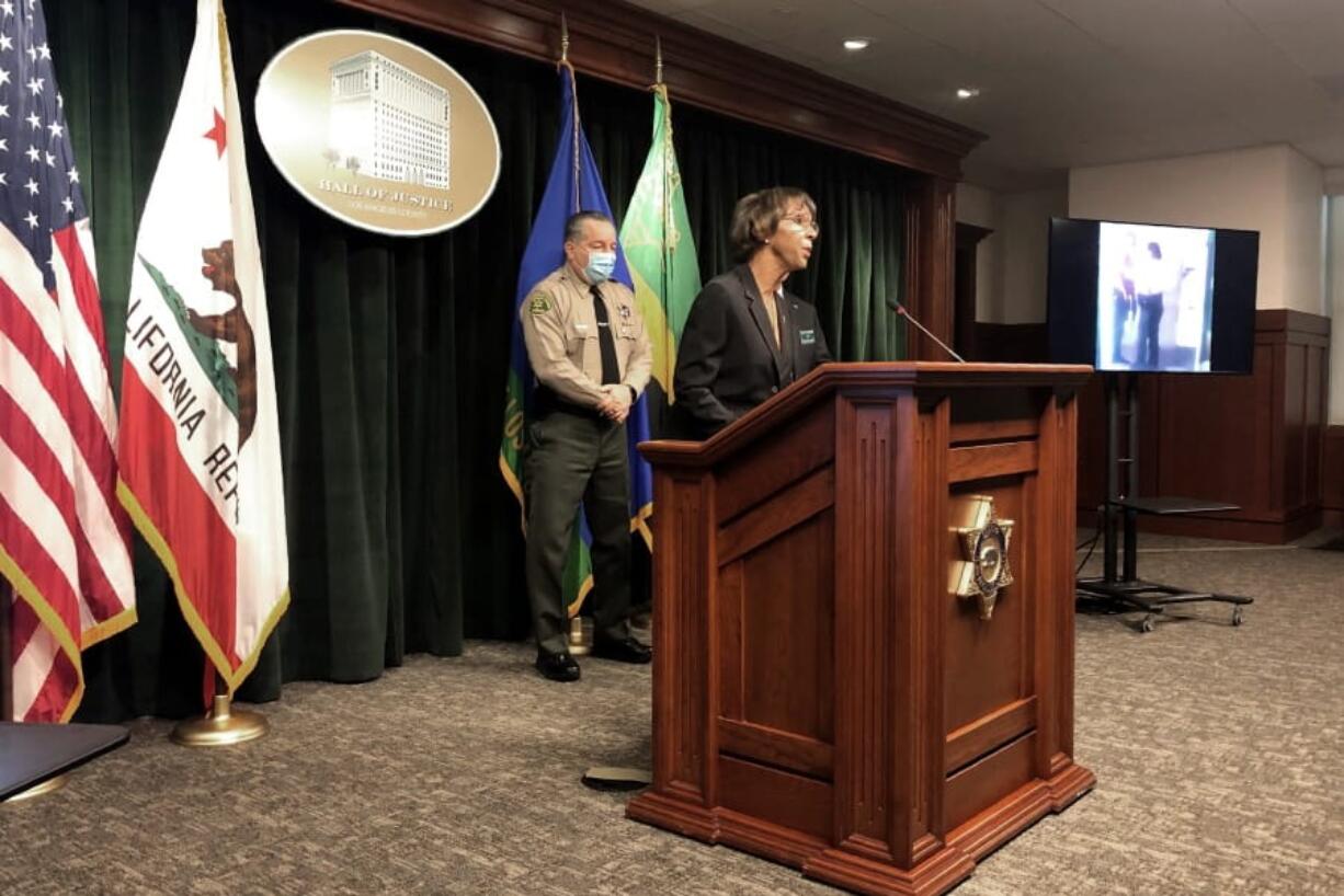 Los Angeles County District Attorney Jackie Lacey, right, and Sheriff Alex Villanueva announce the arrest of a man in connection with the shooting of two Los Angeles County sheriff&#039;s deputies at a news conference in Los Angeles Wednesday, Sept. 30, 2020.  Lacy says attempted murder charges have been filed against Deonte Lee Murray.