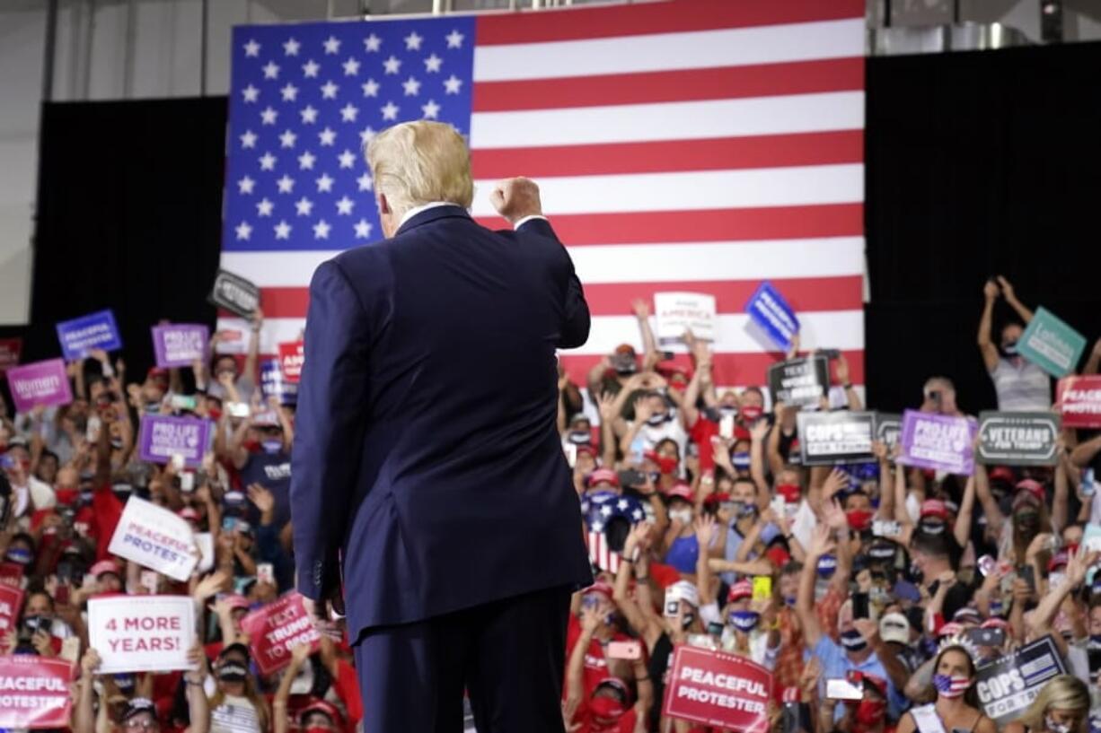 President Donald Trump arrives to speak at a rally at Xtreme Manufacturing, Sunday, Sept. 13, 2020, in Henderson, Nev.