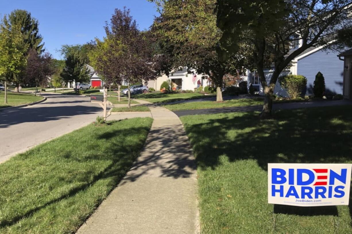 A Biden for President sign in a lawn of suburban Dublin, Ohio, on Friday, Sept. 18, 2020. In the campaign for House control, some districts are seeing a fight between Democrats saying they&#039;ll protect voters from Republicans willing to take their health coverage away, while GOP candidates are raising specters of rioters imperiling neighborhoods if Democrats win.