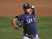 Seattle Mariners&#039; Marco Gonzales pitches against the Oakland Athletics during the first inning of a baseball game in Oakland, Calif., Sunday, Sept. 27, 2020.