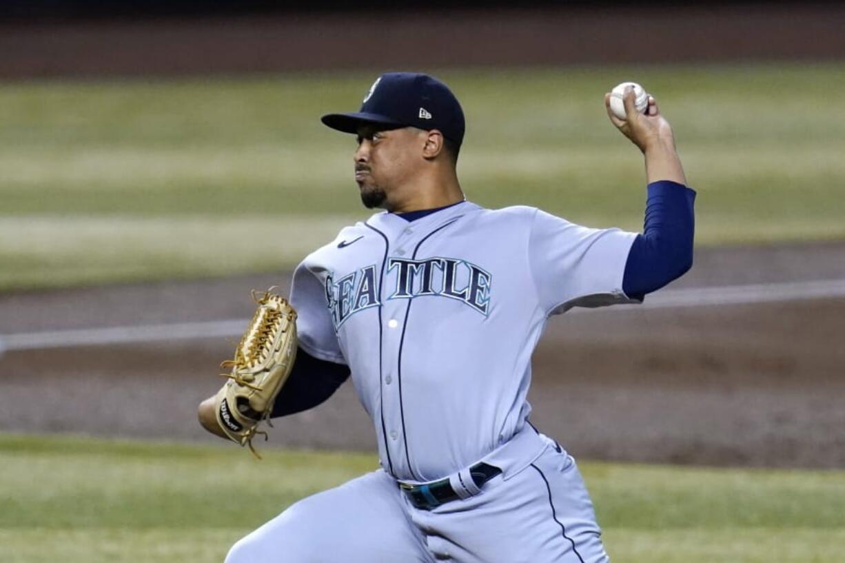 Seattle Mariners starting pitcher Justus Sheffield throws to an Arizona Diamondbacks batter during the first inning of a baseball game Saturday, Sept. 12, 2020, in Phoenix. (AP Photo/Ross D.