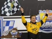 Brad Keselowski (2) celebrates in Victory Lane after winning a NASCAR Cup Series auto race Saturday, Sept. 12, 2020, in Richmond, Va.