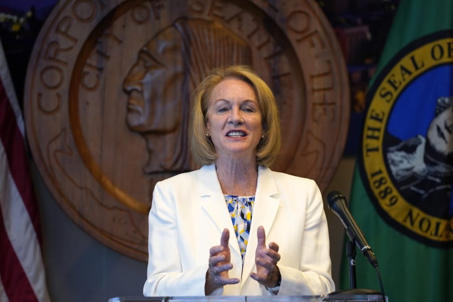 Seattle Mayor Jenny Durkan addresses a news conference about changes being made in the police department Wednesday, Sept. 2, 2020, in Seattle. The Seattle Police Department is reassigning 100 officers from specialty units to patrol in hopes of increasing community engagement and speeding up 911 responses. Durkan and Interim Seattle Police Chief Adrian Diaz described the changes as part of the city&#039;s broader efforts to reimagine the role of officers in response to anti-racism and anti-police protests that have gripped the nation following the killing of George Floyd in Minneapolis.