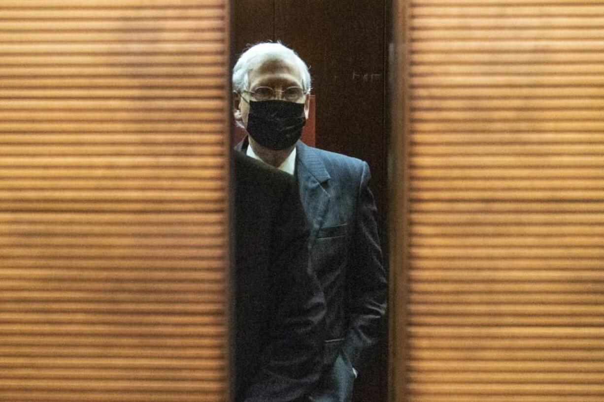 Senate Majority Leader Sen. Mitch McConnell of Ky., takes the elevator as he leaves a Senate Republican policy meeting on Capitol Hill, Thursday, Sept. 17, 2020, in Washington.