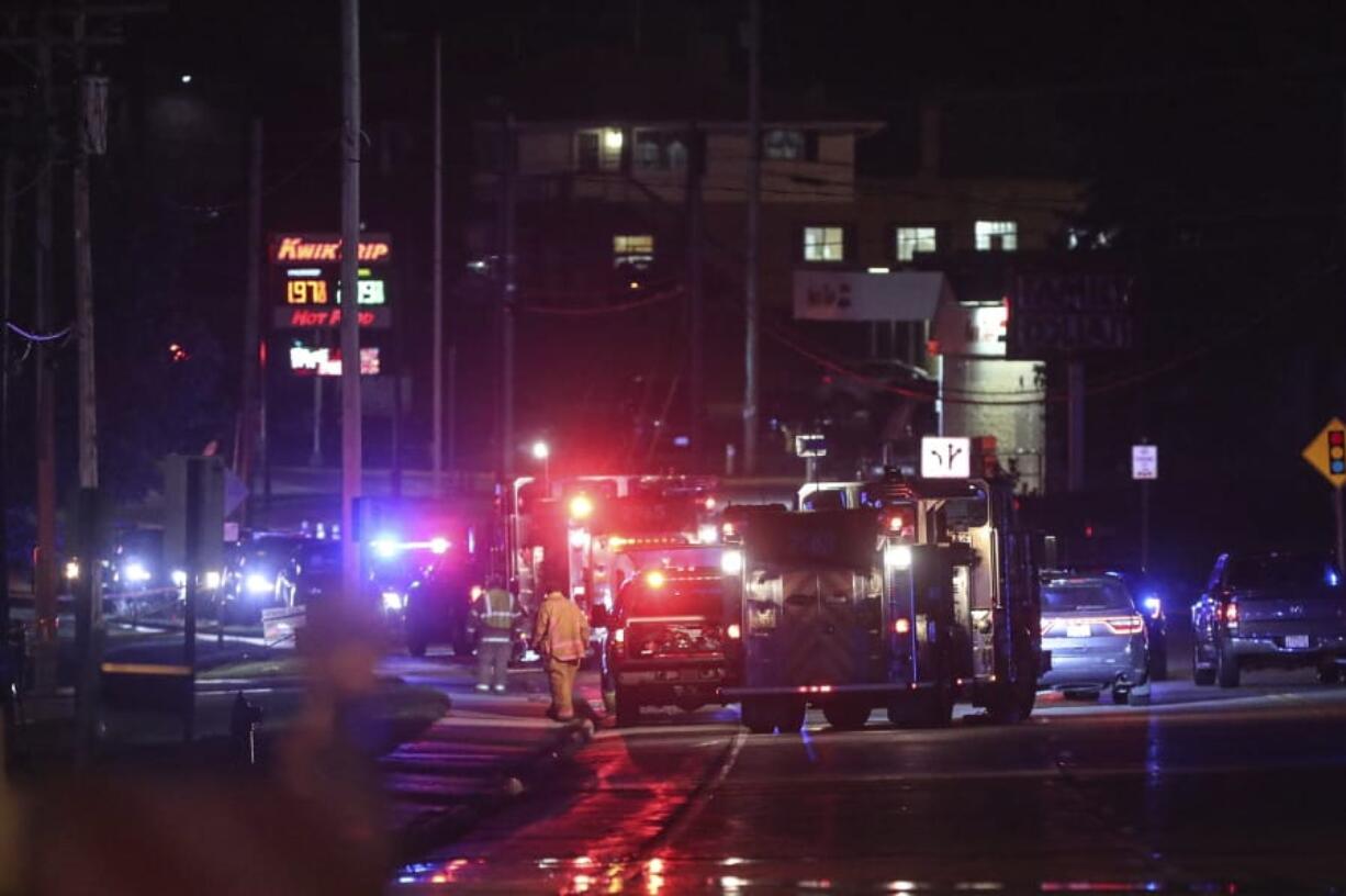 Emergency crews work the scene where multiple people were shot outside a senior living apartment complex, Wednesday, Sept. 16, 2020, in Mayville, Wis.