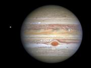 This Aug. 25 image captured by NASA&#039;s Hubble Space Telescope shows the planet Jupiter and one of its moons, Europa, at left, when the planet was 406 million miles from Earth. (NASA, ESA, STScI, A.