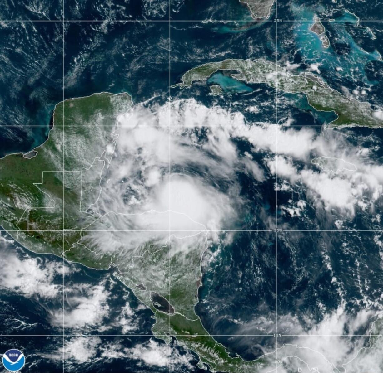 This satellite image released by the National Oceanic and Atmospheric Administration (NOAA) shows Tropical Storm Nana approaching Belize, Wednesday, Sept. 2, 2020. The storm is expected to strengthen throughout the day and make landfall in Belize as a hurricane late Wednesday or early Thursday.